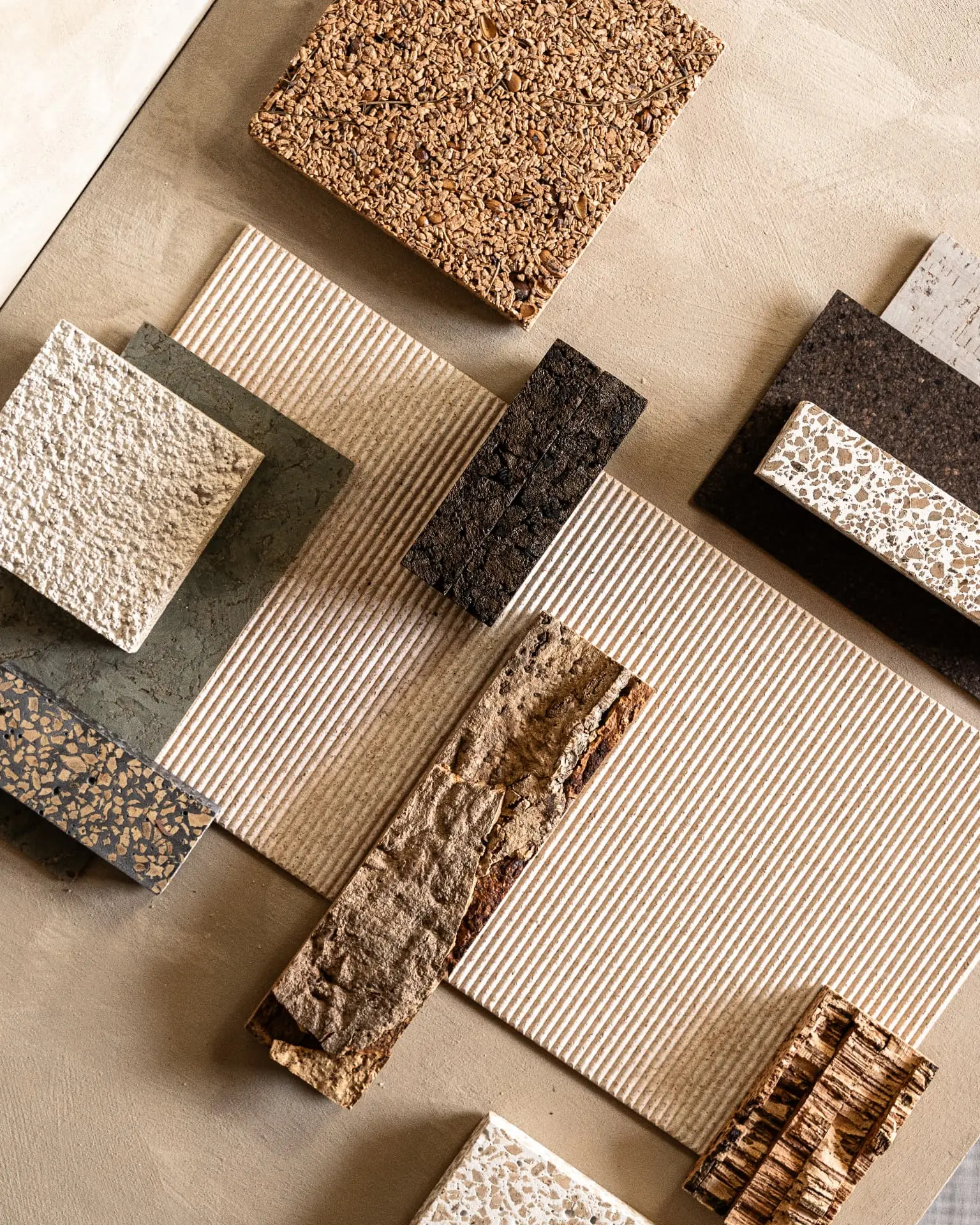 Textured material samples: stone, cork and fluted ceramic