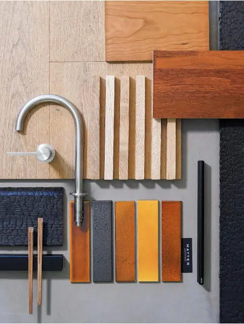Moodboard with a steel tap, timber slats, coloured ceramic pieces and textile samples