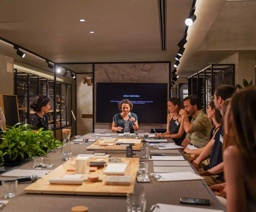 Speakers and attendees seated around Matter’s materials table during the round table