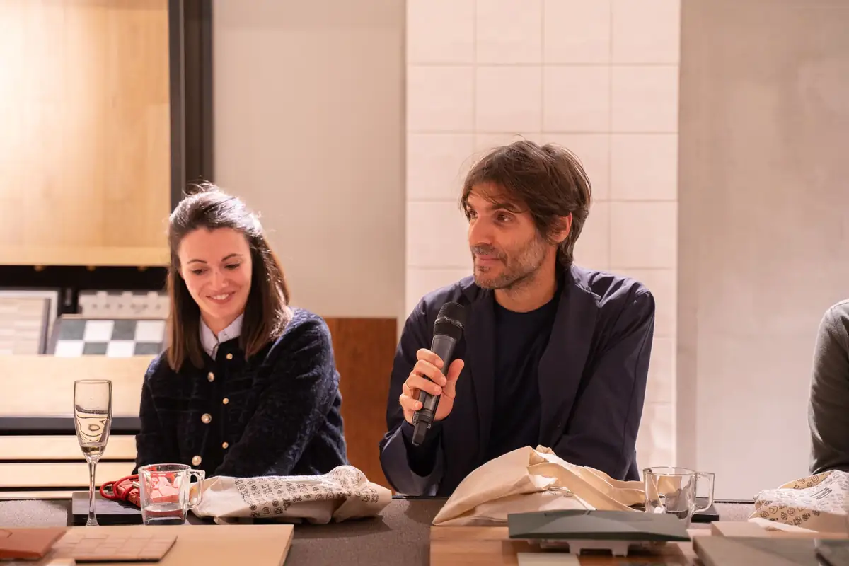 Two attendees take part in the closing conversation
