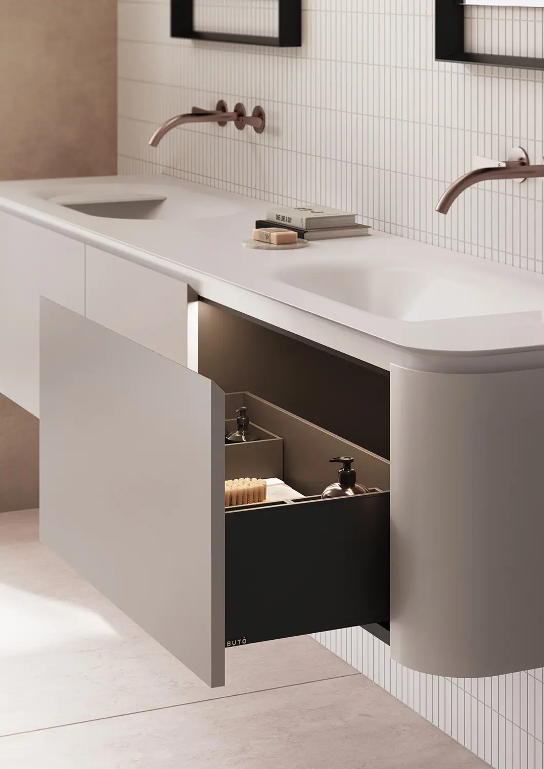 Mueble de baño suspendido lacado en tono claro, con laterales curvos, doble lavabo integrado y un cajón abierto con compartimentos interiores