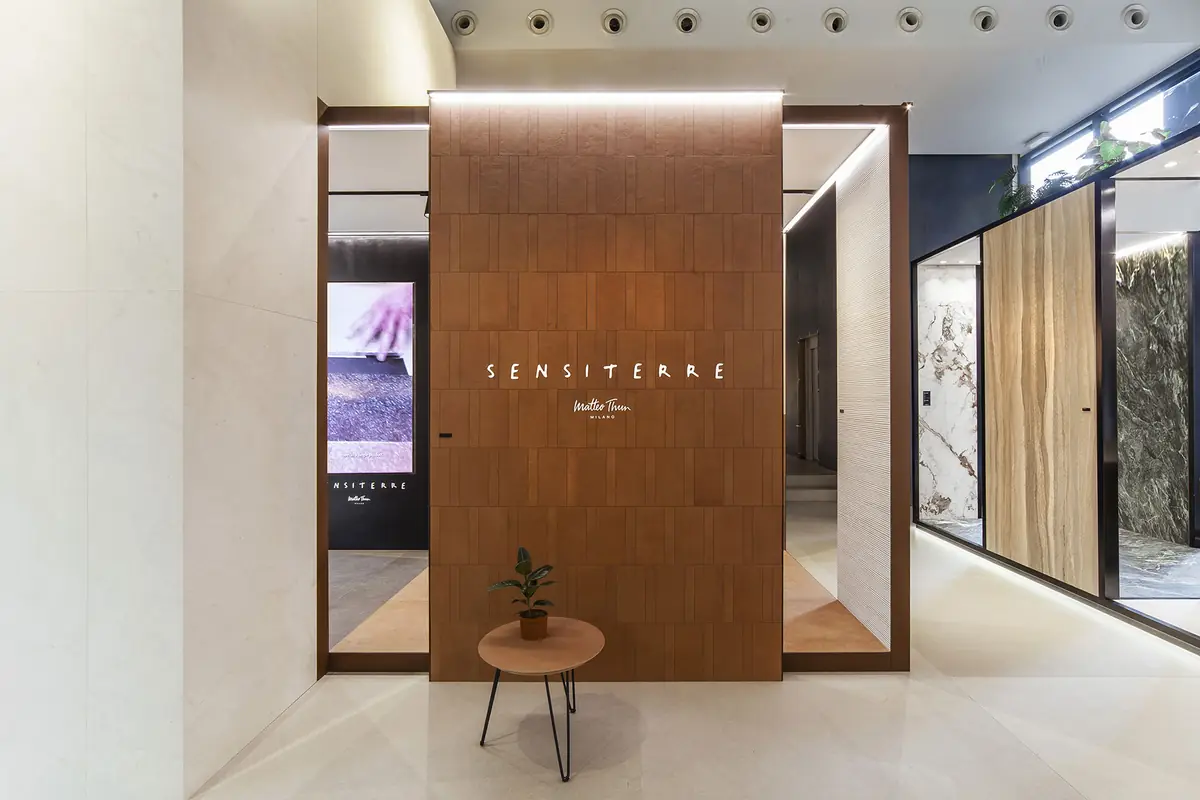 Volume clad in terracotta-coloured tiles with the SensiTerre sign in the Concept Store