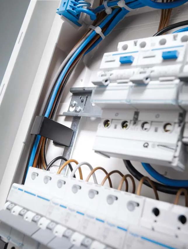 Inside a distribution box with Hager modular residual current devices and circuit breakers and their wiring