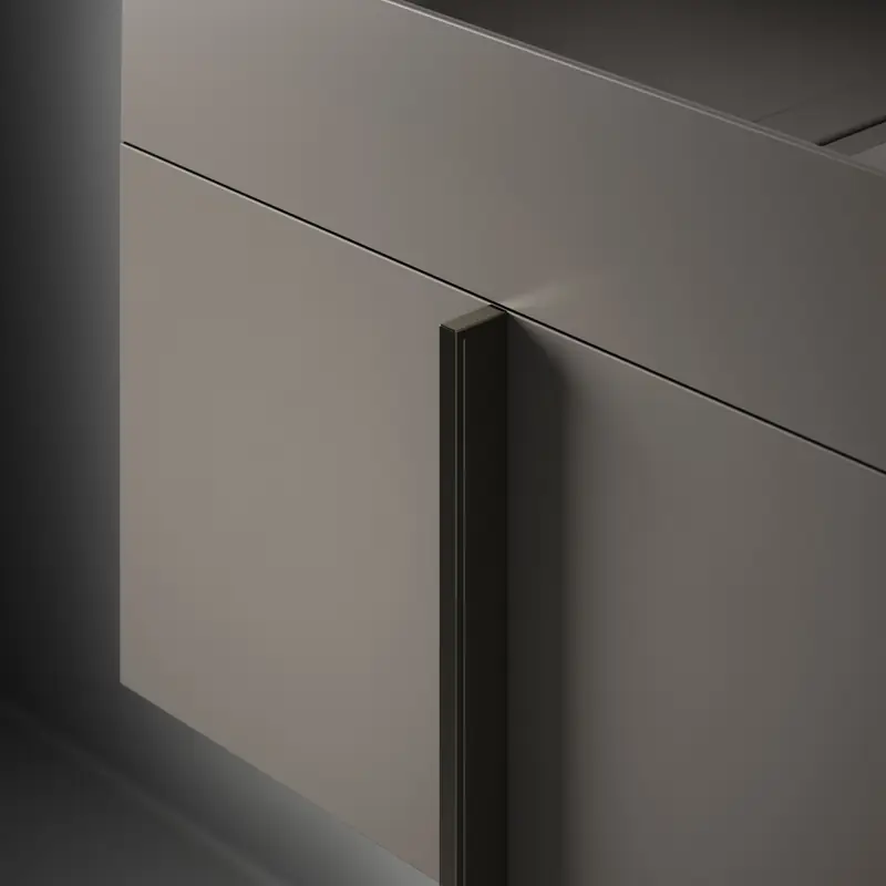 Detail of a grey lacquered Paral front with its dark vertical handle.