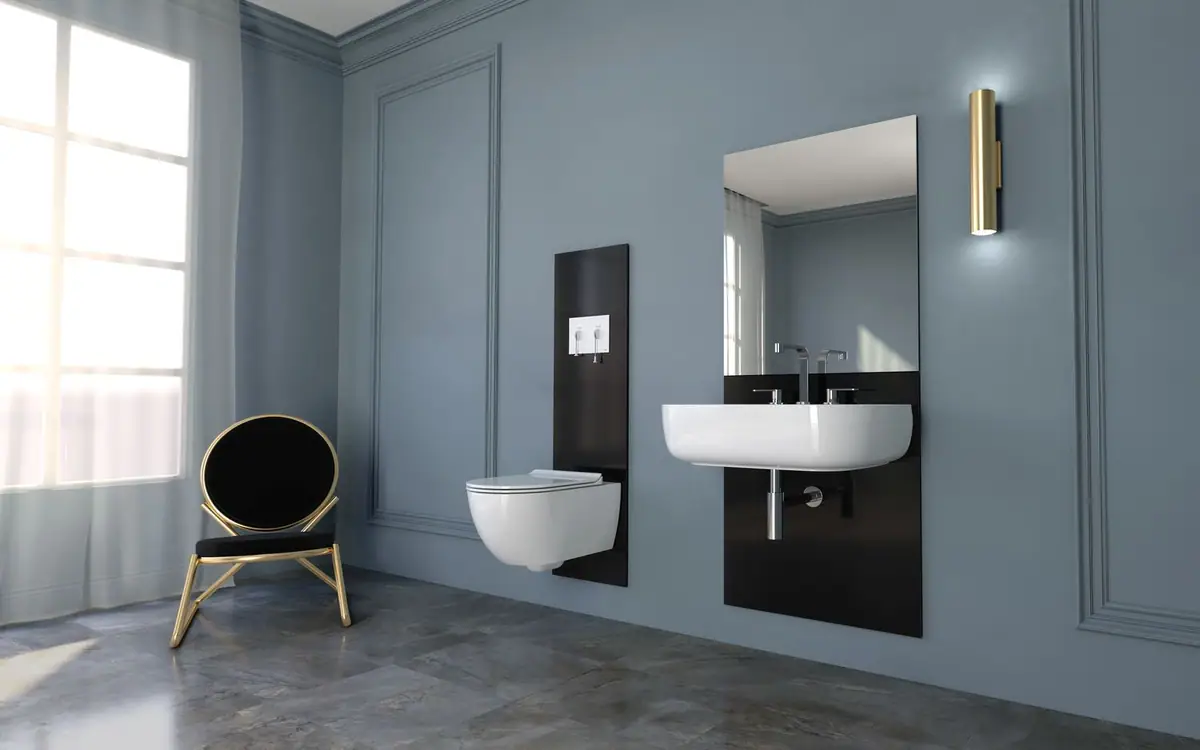 Baño con paredes azul grisáceo, inodoro y lavabo suspendidos sobre paneles negros y un pulsador blanco con dos cordones