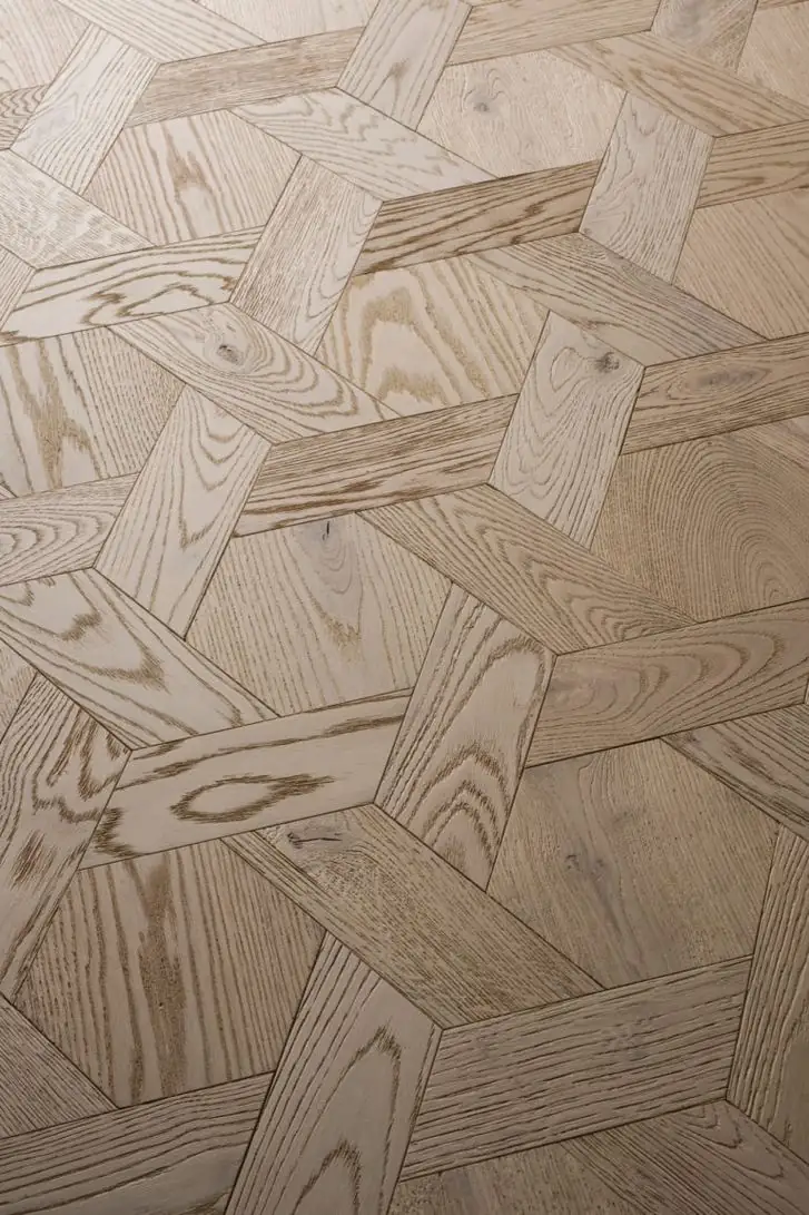 Overhead view of light wood flooring in the Casablanca format, with geometric pieces forming a chequerboard