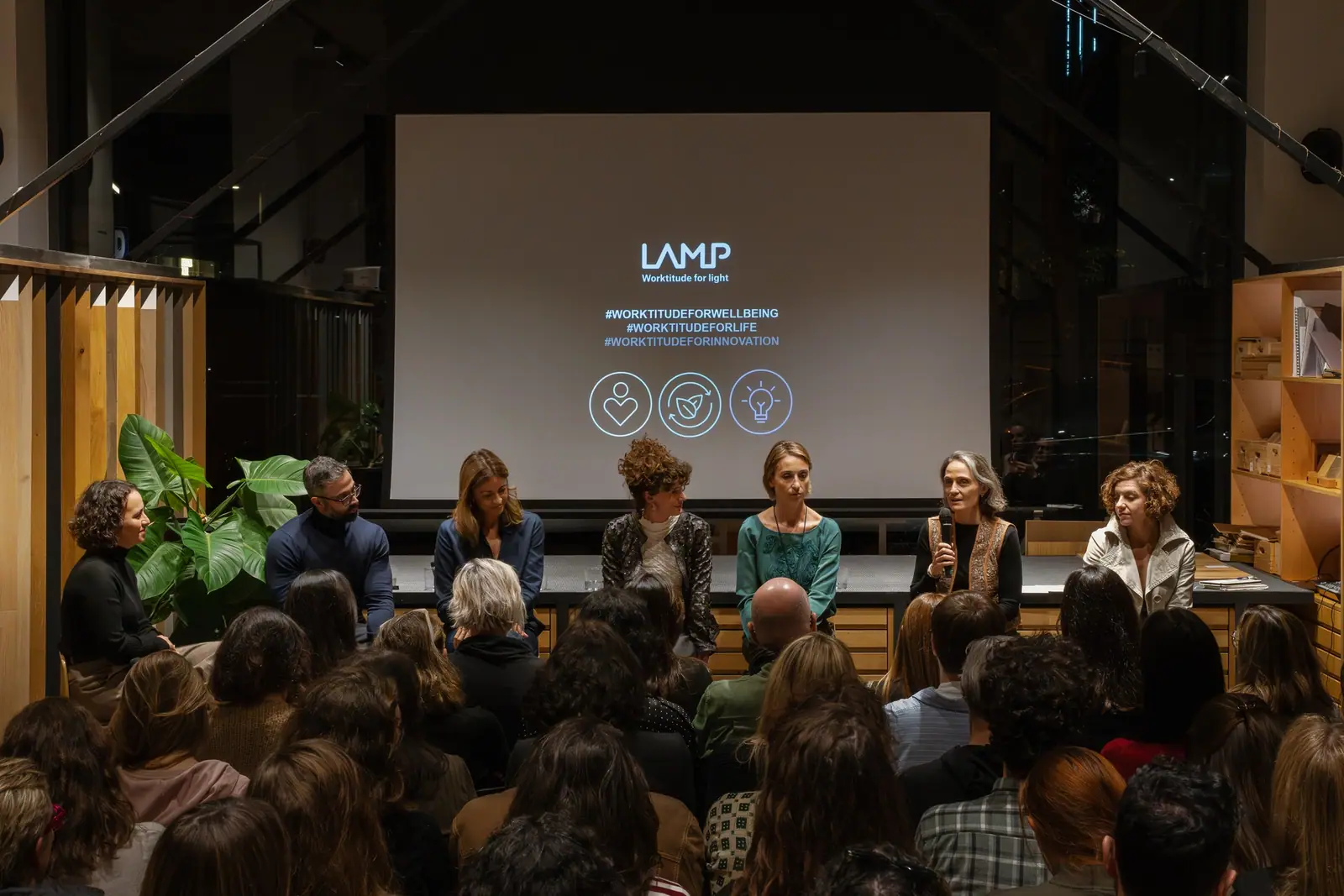 Panel of speakers in front of the audience at the Talk That Matter on neuroarchitecture, sponsored by LAMP