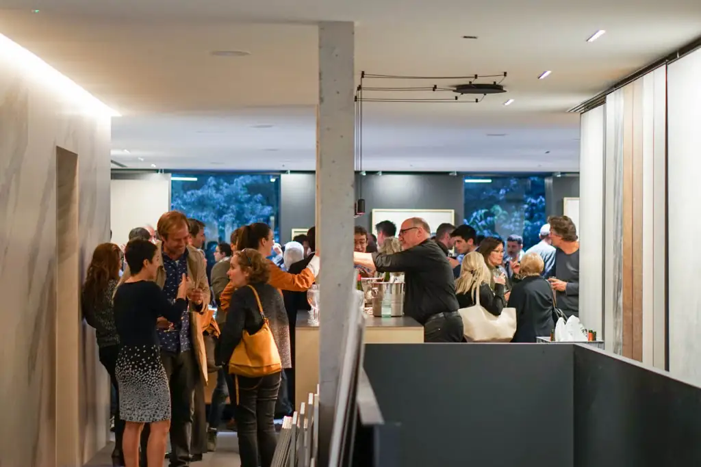 Group of attendees gathered in the Matter space during the aperitif