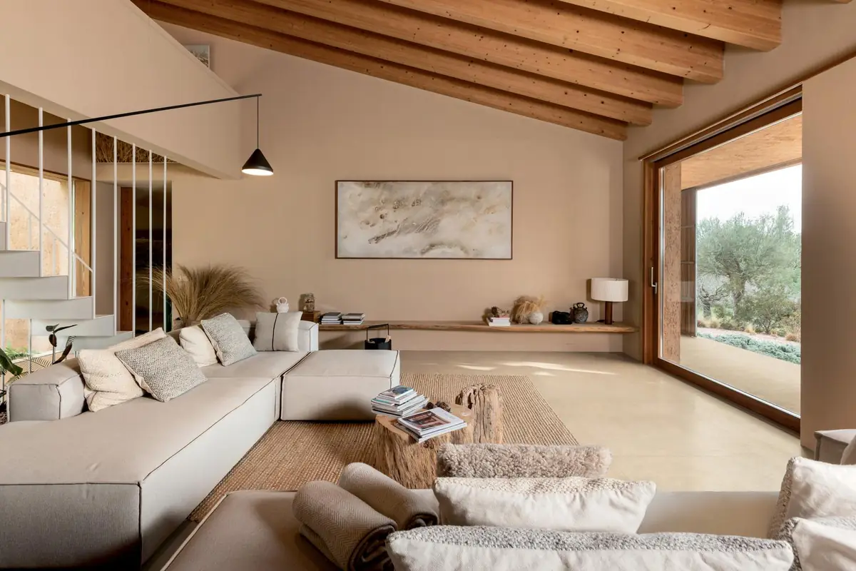 Bright living room with SensiTerre porcelain stoneware flooring in a pale sand tone