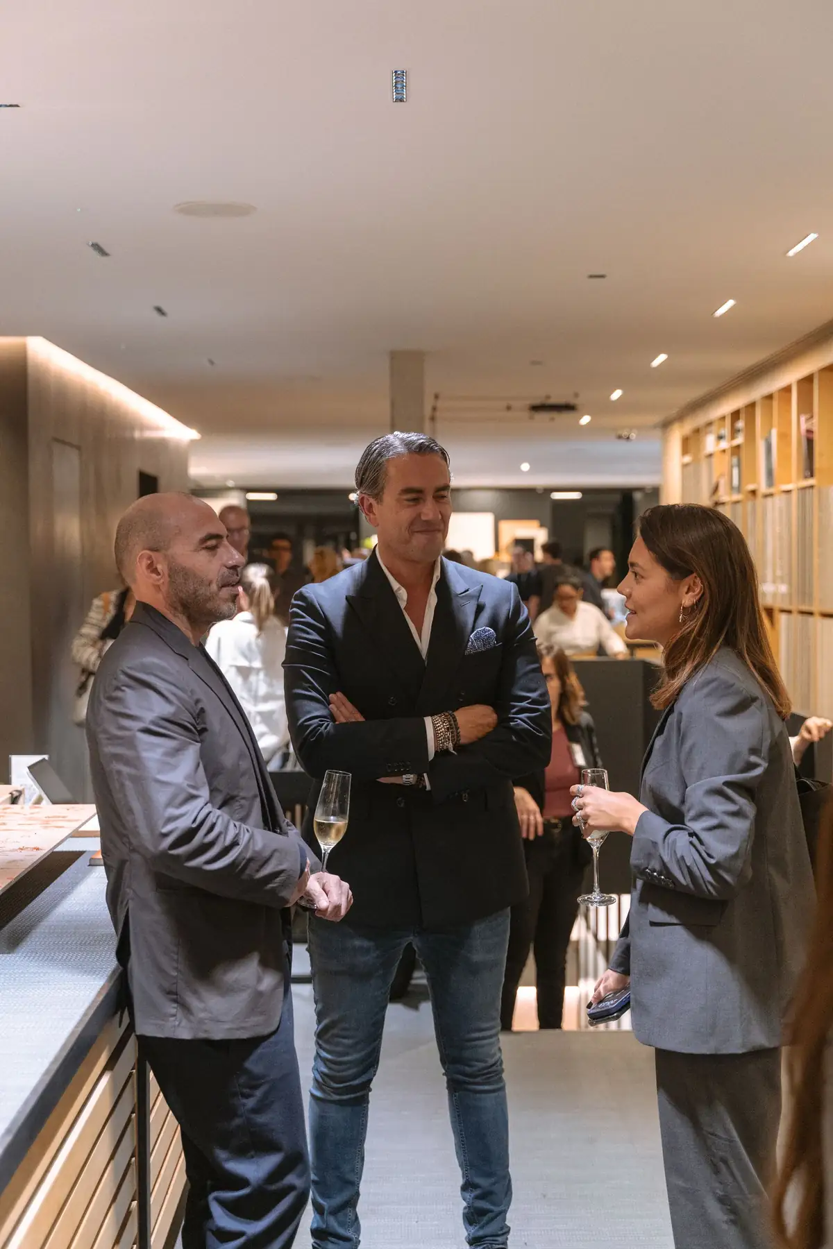 Benedetto Fasciana talking with two guests