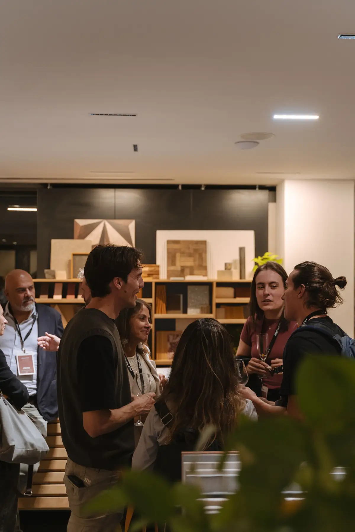 Group of guests talking, drinks in hand