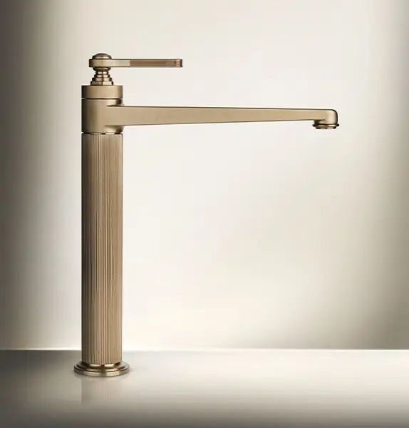 Tall Venti20 basin mixer with a fluted body, top handle and long straight spout in a warm brushed metallic finish