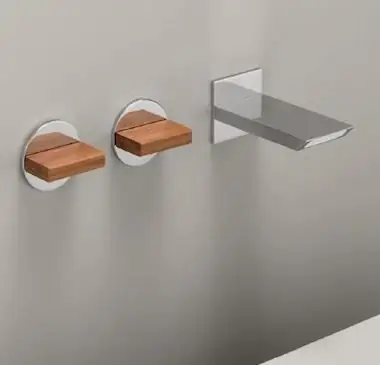 Wall-mounted tapware with a rectangular stainless steel spout and two controls with wooden levers