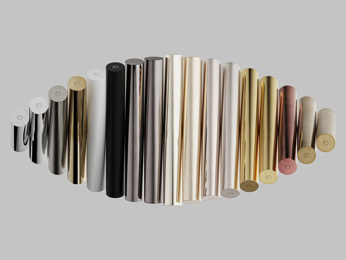 Row of metal cylinders showing tap finishes from chrome to gold, copper and black