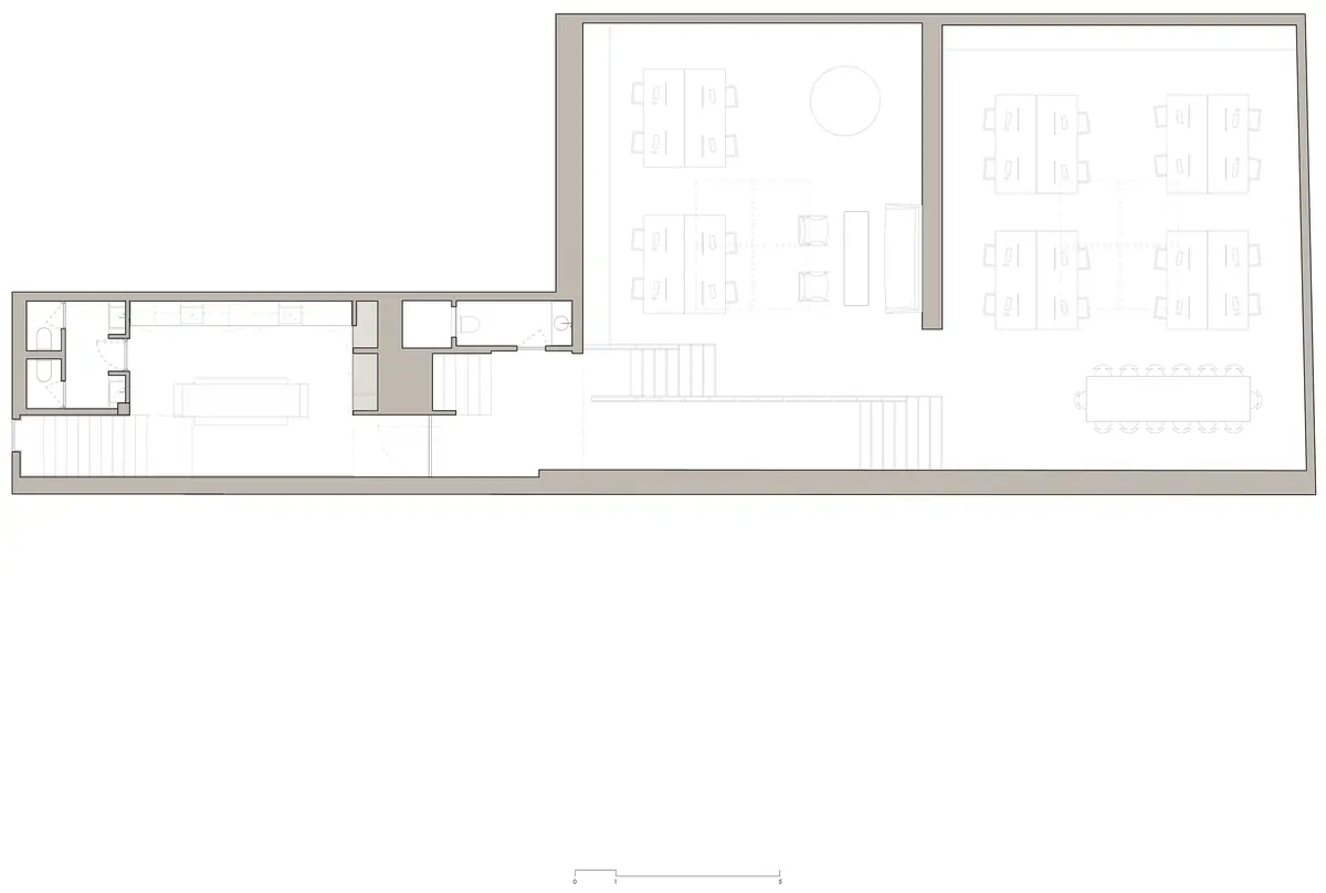 Plan of the studio showing the two large volumes, the work desks and the meeting table