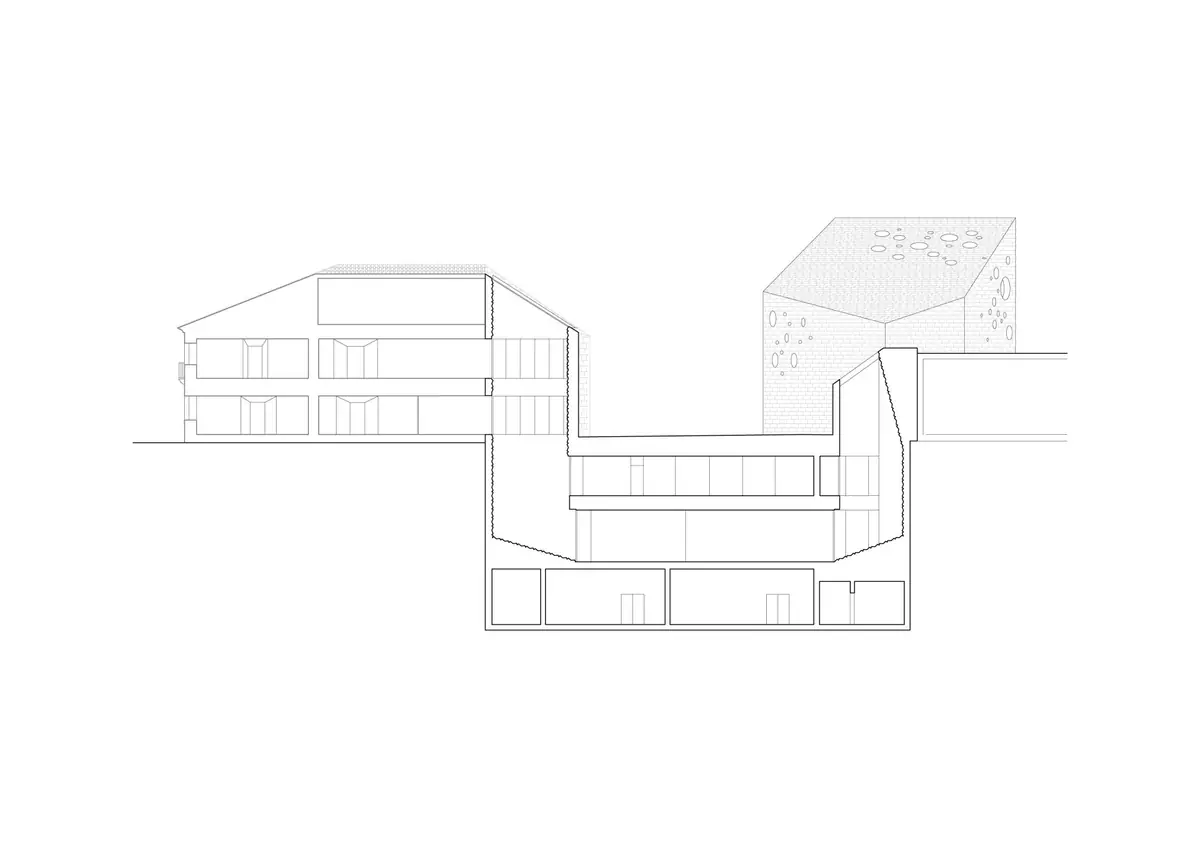 Section through the complex with the old building, the buried floors beneath the square and the tower